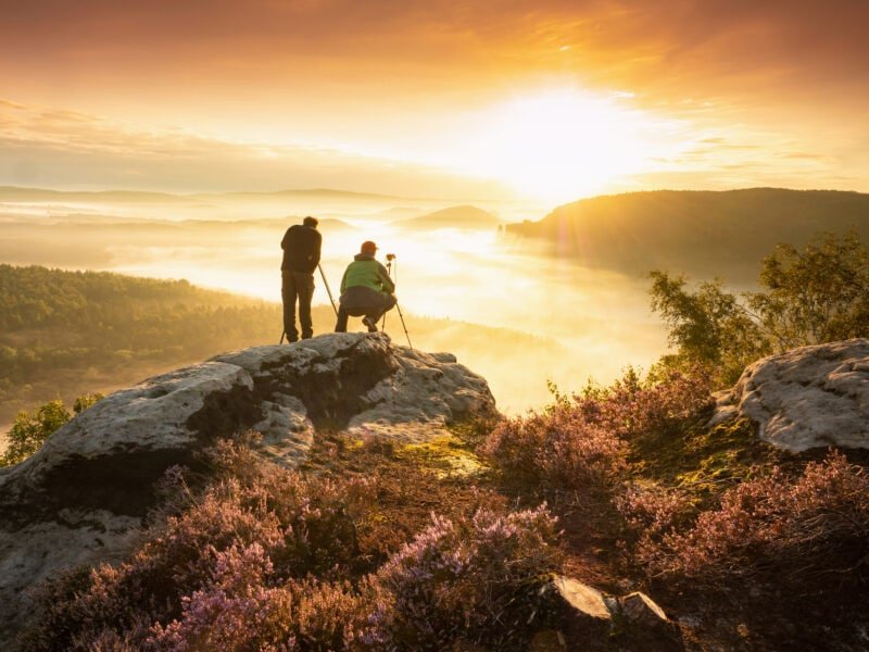 Photographers shooting sunrise on a landscape photography workshop