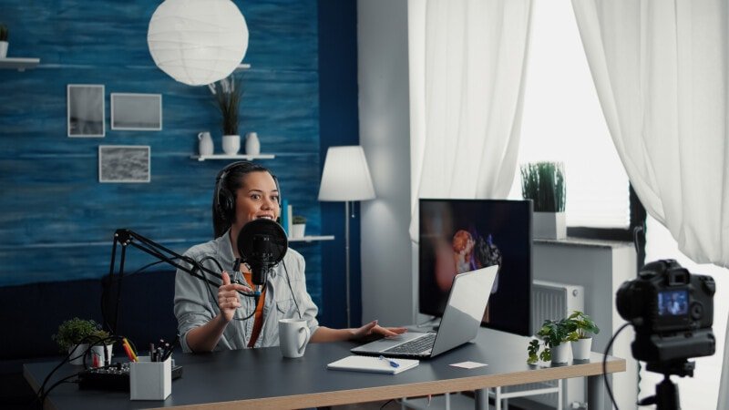 Woman recording a podcast